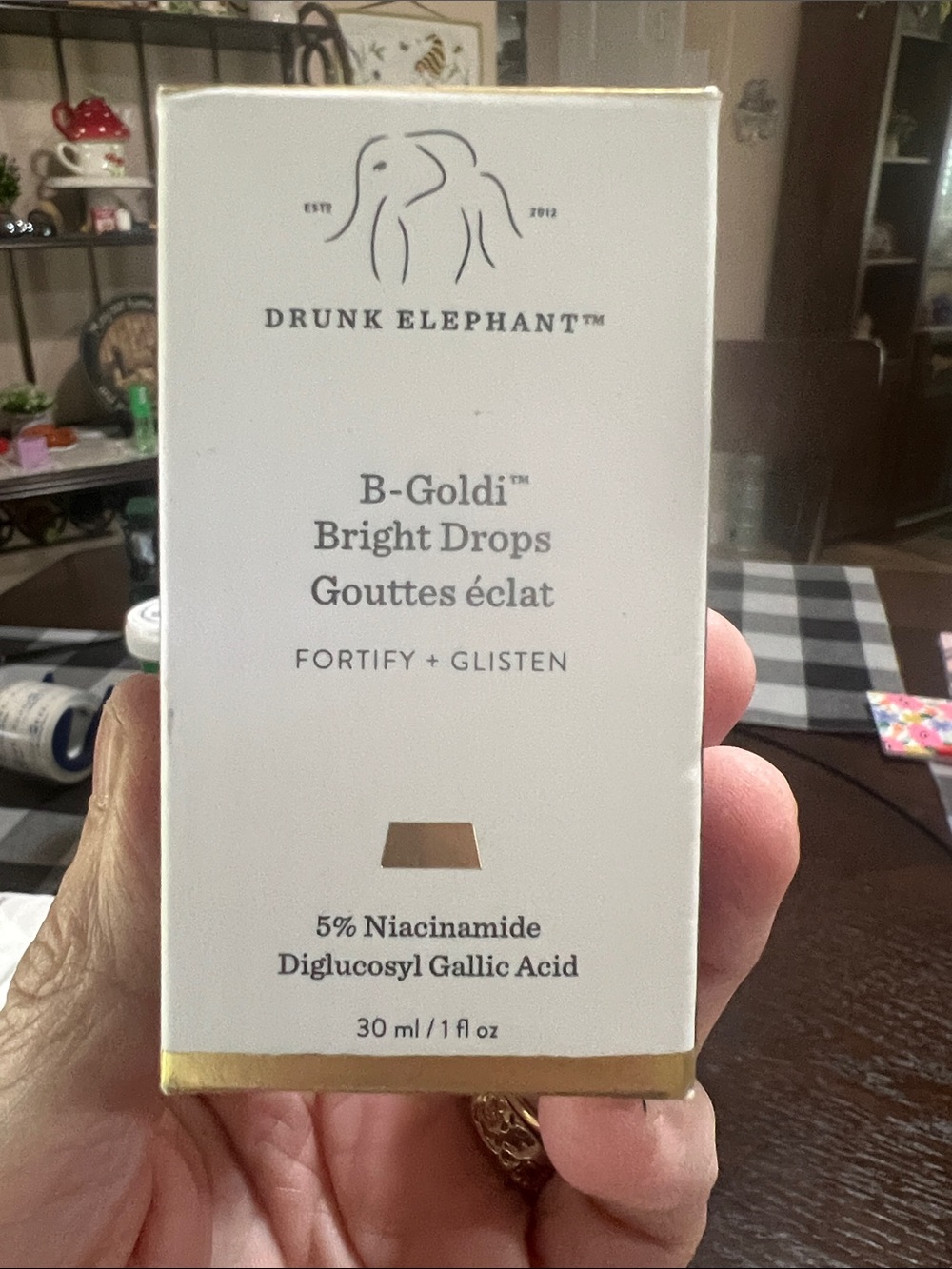 New Drunk Elephant B-Goldi Bright — White & Gold